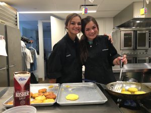 2 students from Dallas, TX enjoying the summer cooking class in NYC!