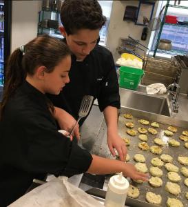 Samantha and Aiden working on Avocado Crab Cakes